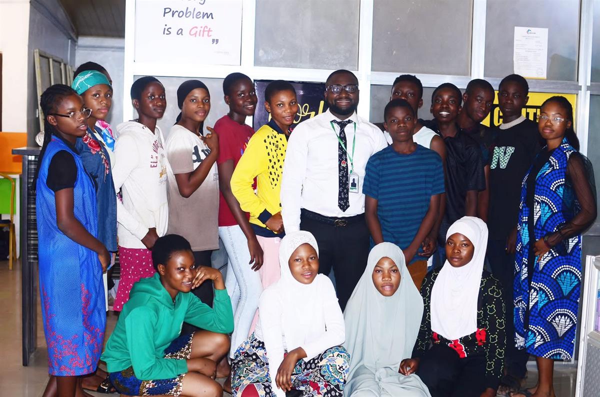Intensive Excellence College director with members of the student community